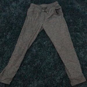Grey size small leggings for kids between the age 6-11 probably. for girls.